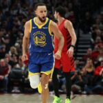 Golden State Warriors guard Stephen Curry (30) reacts after making a three-point basket against the Portland Trail Blazers during the second half at Moda Center