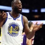 Dec 18, 2025; Phoenix, Arizona, USA; Golden State Warriors forward Draymond Green (23) reacts against the Phoenix Suns at Mortgage Matchup Center.