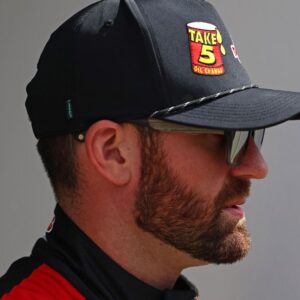 Feb 16, 2025; Daytona Beach, Florida, USA; NASCAR Cup Series driver Corey LaJoie (01) walks to the drivers meeting before the Daytona 500 at Daytona International Speedway.