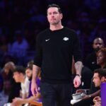 Dec 25, 2025; Los Angeles, California, USA; Los Angeles Lakers head coach JJ Redick watches game action against the Houston Rockets during the first half at Crypto.com Arena.