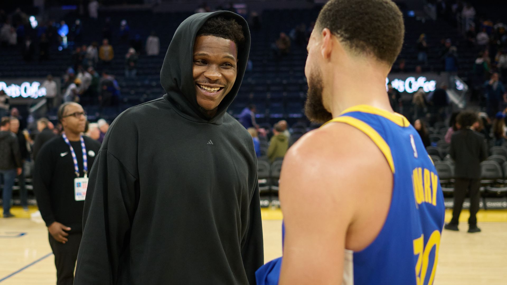 Dec 12, 2025; San Francisco, California, USA; Minnesota Timberwolves guard Anthony Edwards (5) chats with Golden State Warriors guard Stephen Curry (30) at center court after the game at Chase Center.