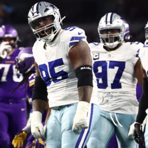 Dallas Cowboys defensive tackle Kenny Clark celebrates after a defensive play