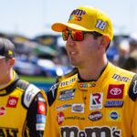 Mar 20, 2022; Hampton, Georgia, USA; NASCAR Cup Series driver Kyle Busch (right) with Christopher Bell during the Folds of Honor QuikTrip 500 at Atlanta Motor Speedway