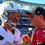 San Diego Chargers quarterback Philip Rivers (17) talks with Atlanta Falcons quarterback Matt Ryan (2) following a 27-3 Falcons win at Qualcomm Stadium.