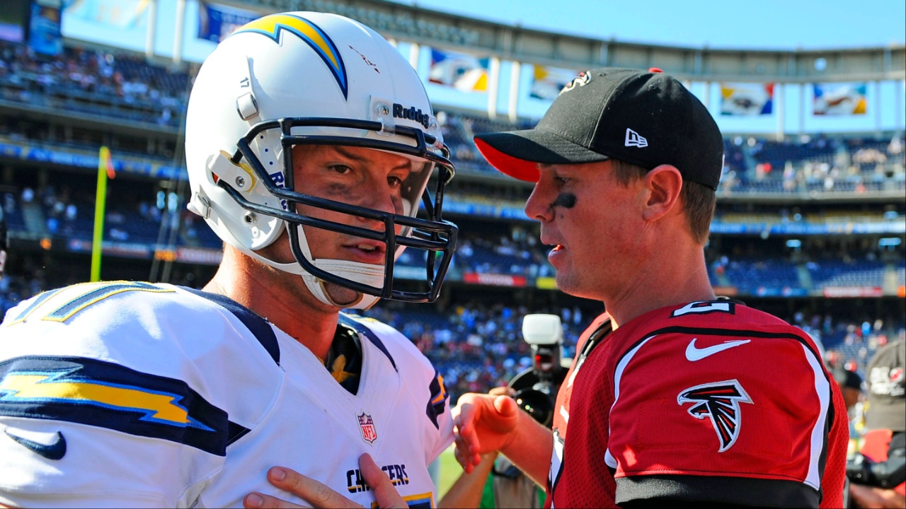 San Diego Chargers quarterback Philip Rivers (17) talks with Atlanta Falcons quarterback Matt Ryan (2) following a 27-3 Falcons win at Qualcomm Stadium.