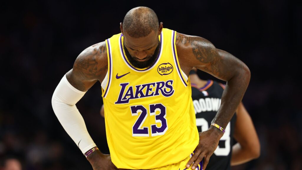 Dec 23, 2025; Phoenix, Arizona, USA; Los Angeles Lakers forward LeBron James (23) reacts against the Phoenix Suns at Mortgage Matchup Center.