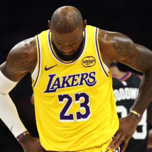 Dec 23, 2025; Phoenix, Arizona, USA; Los Angeles Lakers forward LeBron James (23) reacts against the Phoenix Suns at Mortgage Matchup Center.