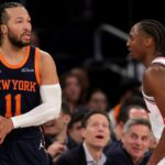 Feb 26, 2025; New York, New York, USA; New York Knicks guard Jalen Brunson (11) looks to in bound the ball against Philadelphia 76ers guard Tyrese Maxey (0) during the fourth quarter at Madison Square Garden