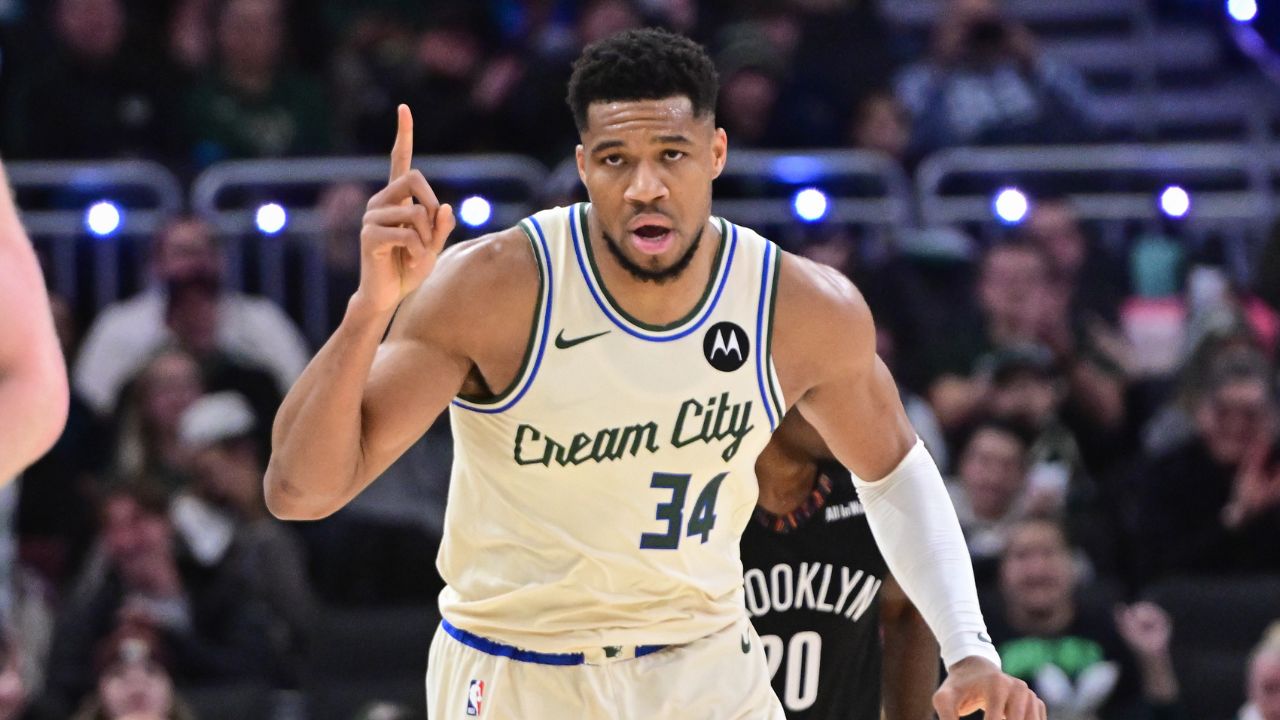 Milwaukee Bucks forward Giannis Antetokounmpo (34) reacts after scoring his 21,000th career point in the third quarter against the Brooklyn Nets at Fiserv Forum.
