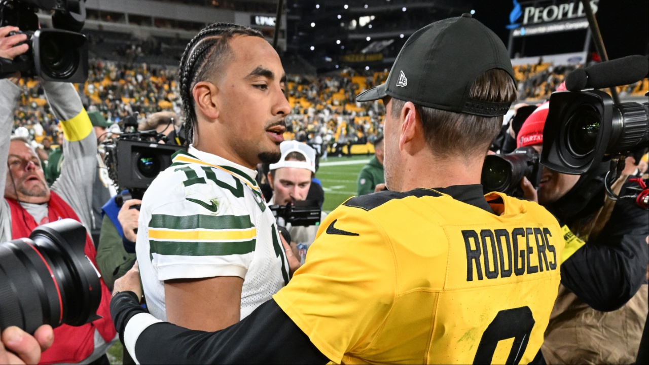 Pittsburgh Steelers quarterback Aaron Rodgers (8) greets Green Bay Packers quarterback Jordan Love (10) following their game at Acrisure Stadium.