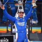 Nov 2, 2025; Avondale, Arizona, USA; NASCAR Cup Series driver Kyle Larson (5) celebrates his championship victory following the Cup Series Championship race at Phoenix Raceway.