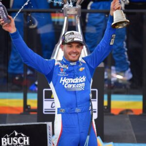 Nov 2, 2025; Avondale, Arizona, USA; NASCAR Cup Series driver Kyle Larson (5) celebrates his championship victory following the Cup Series Championship race at Phoenix Raceway.