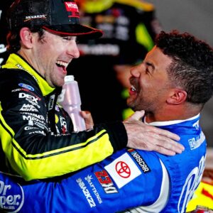 May 22, 2022; Fort Worth, Texas, USA; NASCAR Cup Series driver Ryan Blaney (12) celebrates in Victory lane with NASCAR Cup Series driver Bubba Wallace (23) after winning the All-Star Race at Texas Motor Speedway