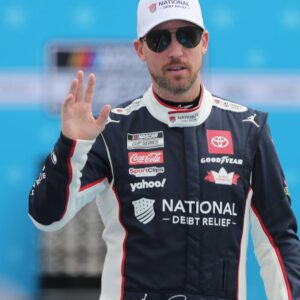 DAYTONA BEACH, FL - FEBRUARY 16: Denny Hamlin ( 11 Joe Gibbs Racing National Debt Relief Toyota) waves to the fans prior to the running of the NASCAR, Motorsport, USA Cup Series Daytona 500 on February 16, 2025 at Daytona International Speedway in Daytona Beach, FL