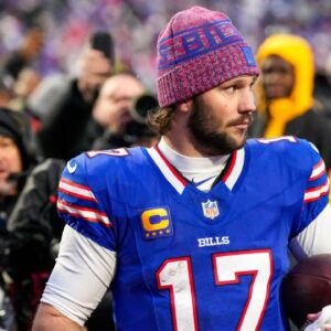 Buffalo Bills quarterback Josh Allen (17) walks off the field after the fourth quarter of the NFL Week 14 game between the Buffalo Bills and the Cincinnati Bengals at Highmark Stadium in Orchard Park, N.Y., on Sunday, Dec. 7, 2025. The Bills overcame a halftime deficit to win 39-34.