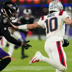 Kyle van Noy and Drake Maye