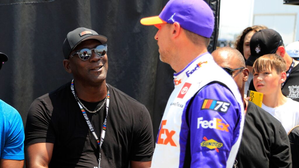 NASHVILLE, TN - JUNE 24: Team 23Xi co-owner Michael Jordan with Denny Hamlin ( 11 Joe Gibbs Racing FedEx Ground Toyota) on pit road prior to qualifying for the NASCAR, Motorsport, USA Cup Series Ally 400 on June 24, 2023