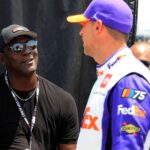 NASHVILLE, TN - JUNE 24: Team 23Xi co-owner Michael Jordan with Denny Hamlin ( 11 Joe Gibbs Racing FedEx Ground Toyota) on pit road prior to qualifying for the NASCAR, Motorsport, USA Cup Series Ally 400 on June 24, 2023