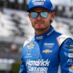 Jun 21, 2025; Long Pond, Pennsylvania, USA; NASCAR Cup Series driver Kyle Larson (5) looks on from pit road during practice and qualifying for The Great American Getaway 400 at Pocono Raceway.