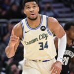 Nov 29, 2025; Milwaukee, Wisconsin, USA; Milwaukee Bucks forward Giannis Antetokounmpo (34) reacts after scoring his 21,000th career point in the third quarter against the Brooklyn Nets at Fiserv Forum.