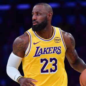 Dec 1, 2025; Los Angeles, California, USA; Los Angeles Lakers forward LeBron James (23) brings the ball up court against the Phoenix Suns during the second half at Crypto.com Arena