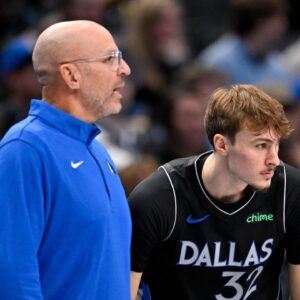 Dallas Mavericks head coach Jason Kidd and forward Cooper Flagg (32) look on during the second quarter against the Memphis Grizzlies at the American Airlines Center
