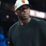 Dec 13, 2025; Las Vegas, Nevada, USA; Chris Paul watches during the Emirates NBA Cup semifinals game between the San Antonio Spurs and Oklahoma City Thunder at T-Mobile Arena.
