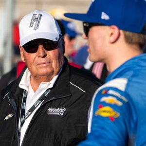 Nov 1, 2025; Avondale, Arizona, USA; Rick Hendrick with NASCAR Xfinity Series driver Corey Day (right) during the Xfinity Series Championship race at Phoenix Raceway