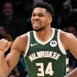 Milwaukee Bucks forward Giannis Antetokounmpo (34) reacts after scoring during the second half against the Charlotte Hornets at the Spectrum Center