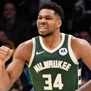 Milwaukee Bucks forward Giannis Antetokounmpo (34) reacts after scoring during the second half against the Charlotte Hornets at the Spectrum Center