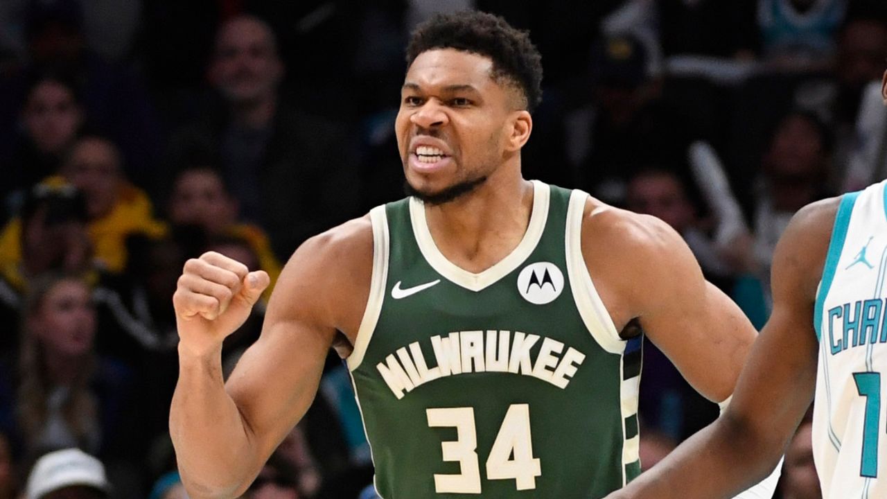 Milwaukee Bucks forward Giannis Antetokounmpo (34) reacts after scoring during the second half against the Charlotte Hornets at the Spectrum Center