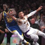 Oct 16, 2019; Los Angeles, CA, USA; Golden State Warriors forward Draymond Green (23) and Los Angeles Lakers guard Danny Green (14) battle for the ball in the first half at Staples Center
