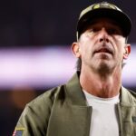 San Francisco 49ers head coach Kyle Shanahan walk off the field after defeating the Carolina Panthers at Levi's Stadium.