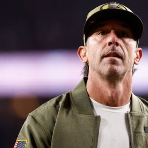 San Francisco 49ers head coach Kyle Shanahan walk off the field after defeating the Carolina Panthers at Levi's Stadium.