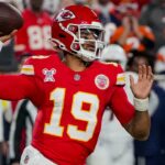 Kansas City Chiefs quarterback Chris Oladokun (19) throws a pass during the second quarter at GEHA Field at Arrowhead Stadium.