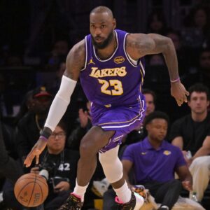 Los Angeles Lakers forward Lebron James (23) takes the ball down court during the second half against the San Antonio Spurs at Crypto.com Arena.