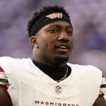 Washington Commanders wide receiver Deebo Samuel Sr. (1) practices before the game at U.S. Bank Stadium.