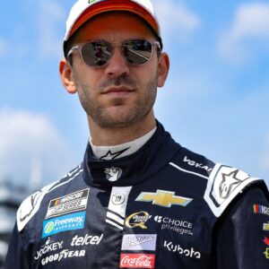 Jun 21, 2025; Long Pond, Pennsylvania, USA; NASCAR Cup Series driver Daniel Suarez walks on pit road during practice and qualifying for The Great American Getaway 400 at Pocono Raceway