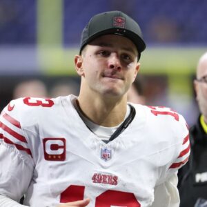 San Francisco 49ers quarterback Brock Purdy (13) leaves the field after the game against the Indianapolis Colts at Lucas Oil Stadium.