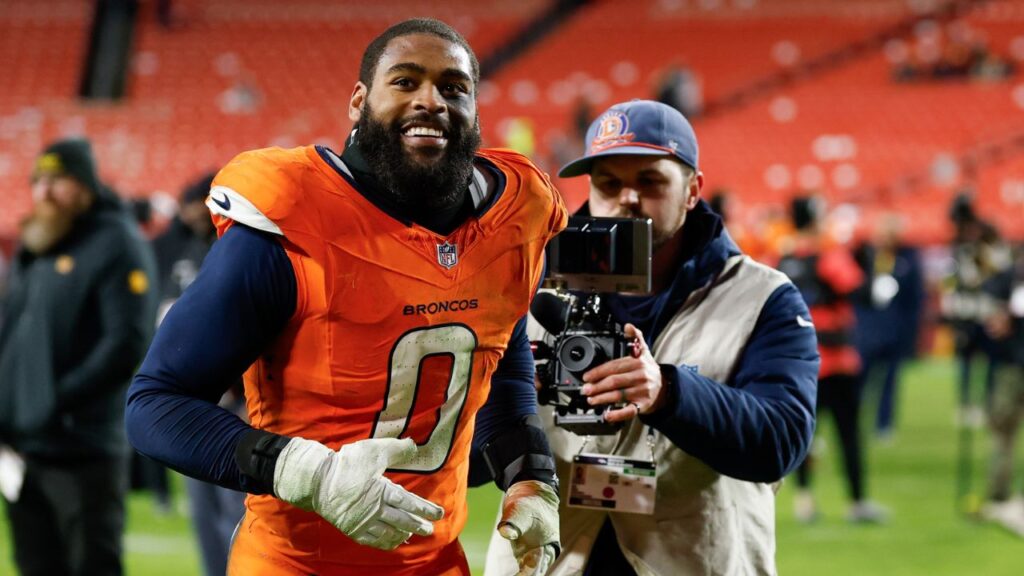Denver Broncos linebacker Jonathon Cooper (0) runs off the field after the game against the Washington Commanders at Northwest Stadium.