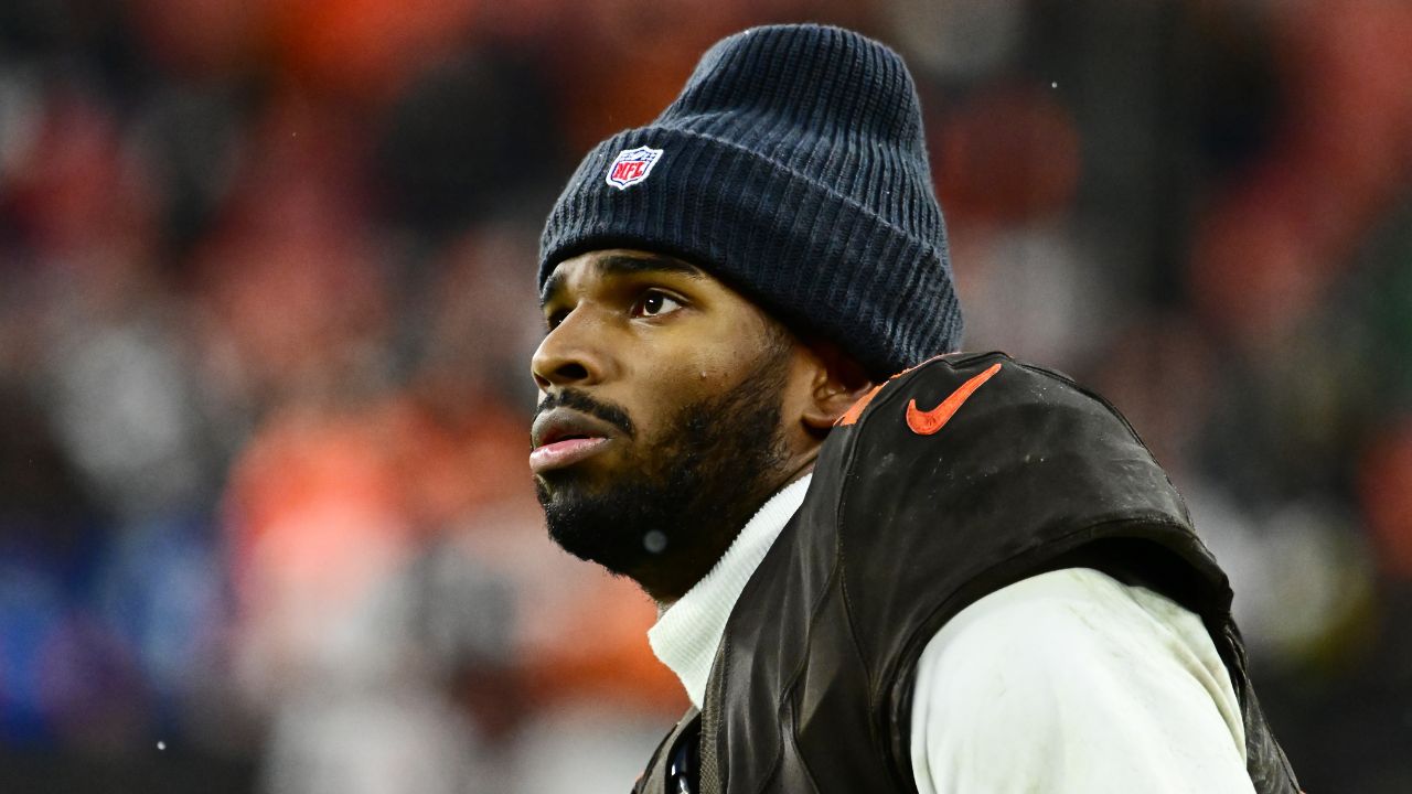 Cleveland Browns quarterback Shedeur Sanders (12) watches from the sidelines late in the fourth quarter against the Tennessee Titans at Huntington Bank Field.