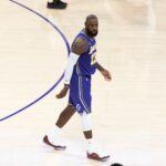 November 28, 2025, Los Angeles, California, USA: Los Angeles LakersÃ¢â‚¬â ¢ LeBron James (23) walks after hitting a 3-point shot against the Dallas Mavericks