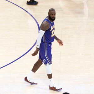 November 28, 2025, Los Angeles, California, USA: Los Angeles LakersÃ¢â‚¬â ¢ LeBron James (23) walks after hitting a 3-point shot against the Dallas Mavericks