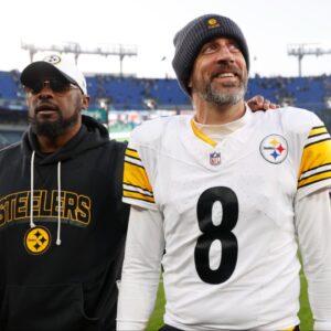 Pittsburgh Steelers head coach Mike Tomlin and quarterback Aaron Rodgers (8) walk off the field after the game against the Baltimore Ravens at M&T Bank Stadium.