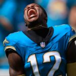 Jacksonville Jaguars wide receiver Travis Hunter (12) yells as his is introduced before an NFL football matchup at EverBank Stadium, Sunday, Sept. 21, 2025, in Jacksonville, Fla. The Jaguars defeated the Texans 17-10.