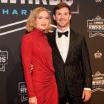 Nov 22, 2024; Charlotte, NC, USA; NASCAR Cup Series driver Daniel Suarez and wife Julia Piquet during the NASCAR Awards Banquet at Charlotte Convention Center.