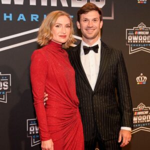 Nov 22, 2024; Charlotte, NC, USA; NASCAR Cup Series driver Daniel Suarez and wife Julia Piquet during the NASCAR Awards Banquet at Charlotte Convention Center.
