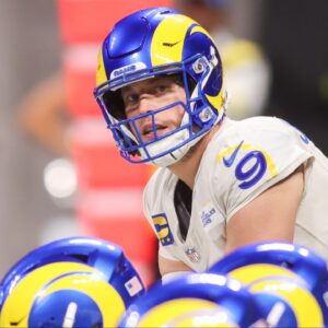 Los Angeles Rams quarterback Matthew Stafford (9) at the line of scrimmage against the Atlanta Falcons in the second quarter at Mercedes-Benz Stadium.