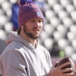 Bills quarterback Josh Allen gets out hours earlier on Empower FIeld at Mile High in Denver, Colorado to warm up before the game on Jan. 17, 2026.
