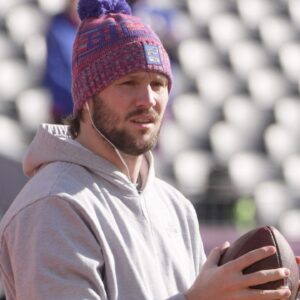 Bills quarterback Josh Allen gets out hours earlier on Empower FIeld at Mile High in Denver, Colorado to warm up before the game on Jan. 17, 2026.
